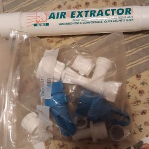 Water bed air extractor